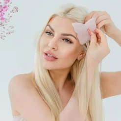 Gesichtsmassage-Platte aus Rosenquarz Schmetterling