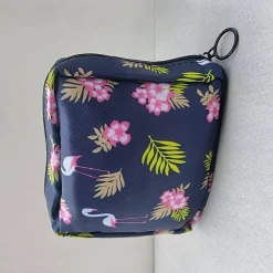 Mini-Tasche für Damenhygieneartikel, Flamingos und Palmblätter, dunkelblau